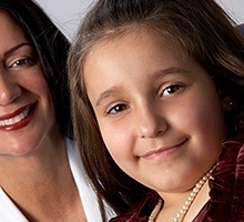 Smiling young girl in dental office