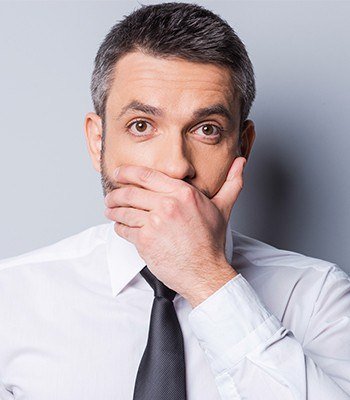 Man covering his mouth