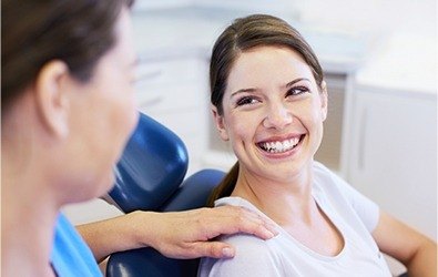 Smiling woman in dental office